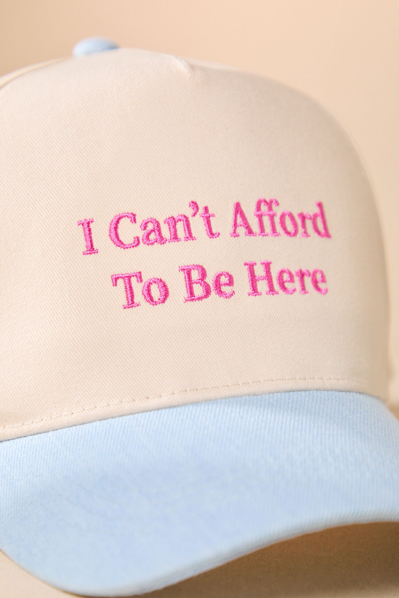 I Can't Afford To Be Here Trucker Hat